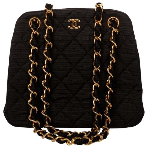 chanel blacl leather partial quilt gold chain straptote bag|Clutches with Chain .